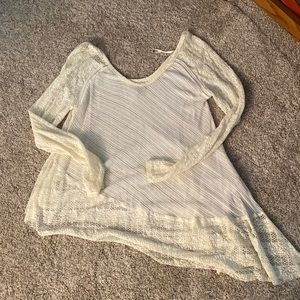 Free People Asymmetrical too. Beautiful cream and lace